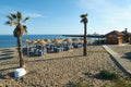 Beach bar in Marbella with palmtrees and hammocks Royalty Free Stock Photo