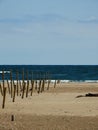 Beach barbed wire fence sand  vertical Royalty Free Stock Photo