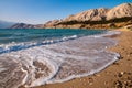 Beach at Baska with foam sea wave in Krk Royalty Free Stock Photo