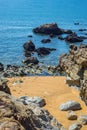 Beach bay rocky shore cove with blue ocean wave, Algarve Royalty Free Stock Photo