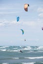 Beach Beauduc : Tourists and locals kitesurfing on large, remote beach with fine sand, popular destination in Southern France