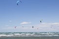 Beach Beauduc : Tourists and locals kitesurfing on large, remote beach with fine sand, popular destination in Southern France