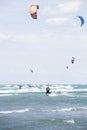 Beach Beauduc : Tourists and locals kitesurfing on large, remote beach with fine sand, popular destination in Southern France