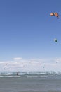 Beach Beauduc : Tourists and locals kitesurfing on large, remote beach with fine sand, popular destination in Southern France