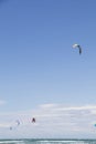 Beach Beauduc : Tourists and locals kitesurfing on large, remote beach with fine sand, popular destination in Southern France