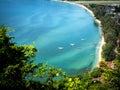 The beach of beautiful tropical sea. The fishing boat is parked.