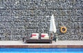 Beach bed with rock wall background Royalty Free Stock Photo