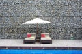 Beach bed with rock wall background Royalty Free Stock Photo