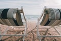 Beach bed with sun flare twilight time. Royalty Free Stock Photo
