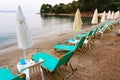 Beach beds and umbrellas Royalty Free Stock Photo