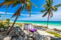 Beach beds under the palm trees on paradise beach at tropical Resort. Riviera Maya - Caribbean coast at Tulum in Quintana Roo, Royalty Free Stock Photo