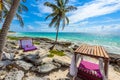 Beach beds under the palm trees on paradise beach at tropical Resort. Riviera Maya - Caribbean coast at Tulum in Quintana Roo, Royalty Free Stock Photo