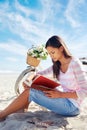 Beach bicycle woman reading book Royalty Free Stock Photo