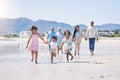 Beach, big family and children holding hands, running and happiness on summer vacation together in Mexico. Sunshine, fun Royalty Free Stock Photo