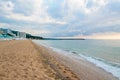 Beach of Black Sea from Golden Sands, Bulgaria with blue clear water, fluffy clouds sky, hotels Royalty Free Stock Photo