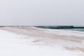 Beach during a blizzard and snowfall, minimalist landscape Royalty Free Stock Photo