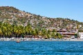 Beach and boats along the shore in Zihuatanejo, Mexico