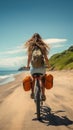 Beach bound cyclist Rear view of a woman with a surfboard on her bike