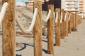 Beach boundary fence with wood and rope in Arenales del Sol Royalty Free Stock Photo