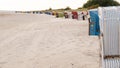 Beach box on the sea coast.Walks and rest on the Wadden Sea.Beach wicker boxes set on white sand.Fer Island.North Sea Royalty Free Stock Photo