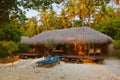 Beach bungalow at sunset - Maldives