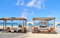 Beach cabanas on a white sandy beach