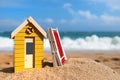 Beach cabin and folded chair Royalty Free Stock Photo