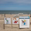 Beach cabins decorated with popular artwork cabinart