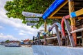 Beach cafe with outriggers from old traditional Indonesian longtail boats as handrails Nusa, Lembongan, Indonesia