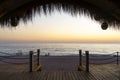 Beach cafe on sea sunset. Beautiful tropical evening on the coast. Relax, summer, vacation. Royalty Free Stock Photo