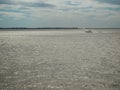 Beach, calm sea and grey sky Royalty Free Stock Photo