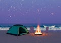 Beach Camping with Bonfire Under Starry Sky Royalty Free Stock Photo