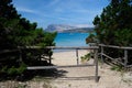 The beach of Capo Coda di Cavallo, in background the island of Tavolara Royalty Free Stock Photo