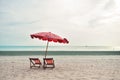 Beach Chair and Beach Umbrella On the beach