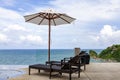 Beach chair in outdoor with swimming pool and sea view andaman sea Royalty Free Stock Photo