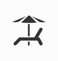 Beach chair with umbrella icon