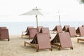 Beach chair and umbrella on sand beach. Concept for rest, relaxa