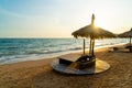 Beach chair and umbrella with sea beach background Royalty Free Stock Photo