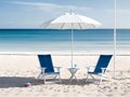 Beach chair and umbrella in summer sunny day Royalty Free Stock Photo