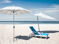 Beach chair and umbrella in summer sunny day Royalty Free Stock Photo