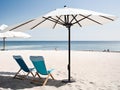 Beach chair and umbrella in summer sunny day Royalty Free Stock Photo