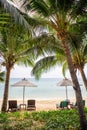 Beach chair under coconut tree looking away to sea view. Praw Bay, Samed,Thailand