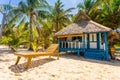 Beach chairs, clear water and beautiful view on tropical island, near Palawan, Phillippines