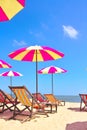 Beach chairs and colorful umbrella on the beach with blue sky, Cha am, Thailand Royalty Free Stock Photo