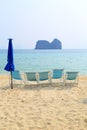 Beach chairs on sea coast. Royalty Free Stock Photo