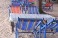Beach chairs and small table on the seaside at Chanthaburi, Thailand. Royalty Free Stock Photo