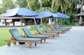 Beach chairs and umbrella