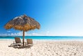 Beach chairs with umbrella and beautiful sand beach