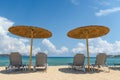 Beach chairs with umbrella with blue sky