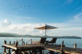 Beach Chairs and Umbrella on island in Phuket, Thailand. Summer, Travel, Vacation and Holiday concept Royalty Free Stock Photo